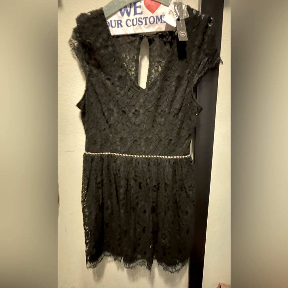 Lace pull on cocktail dress with open back